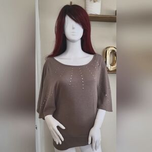 Adjustable off shoulder top with bling studs. New